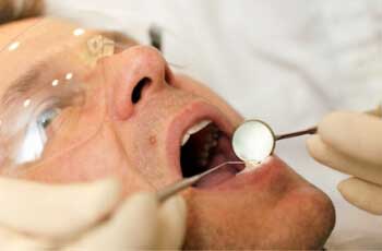 Man undergoing dental checking