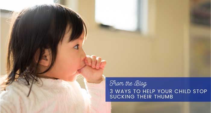 Small baby sucking her thumb