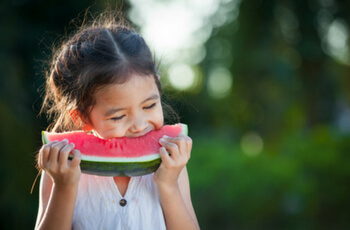 Girl eating Watermelon